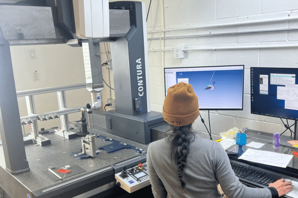 Coordinate measuring machine inspection of a precision machined part at Rainhouse, verifying dimensional accuracy and quality requirements